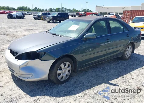 2002 Toyota Camry Le z USA, uszkodzony, nr VIN 4T1BE32K02U587544